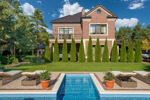 luxurius swimming pool view with house elevation